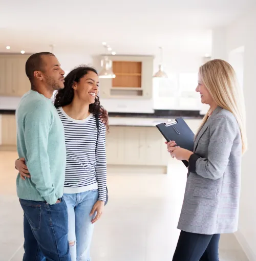 Couple being shown a house.