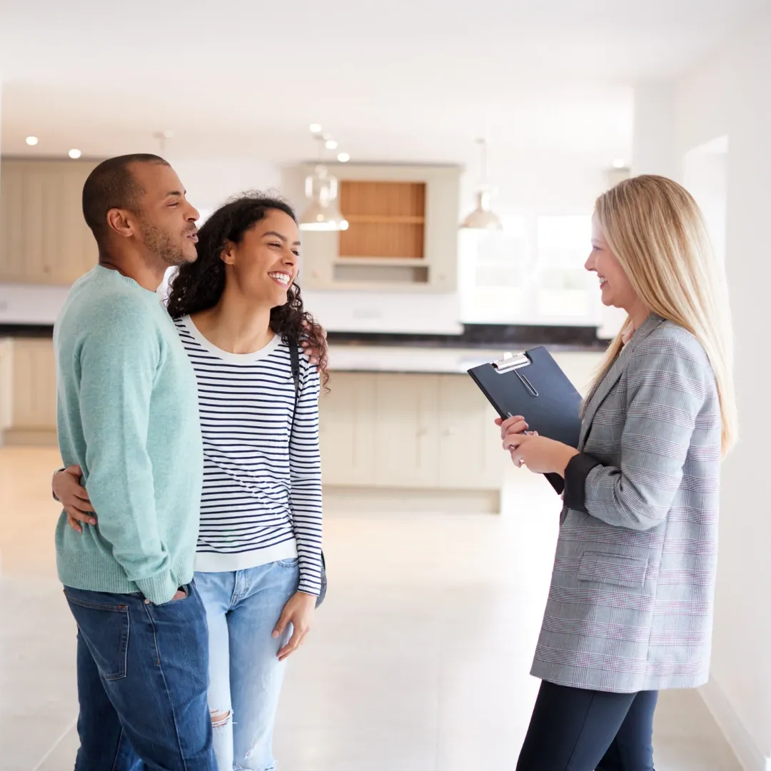 Couple being shown a house.