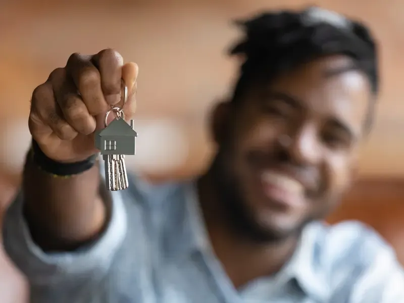 Tenant with keys to new home.