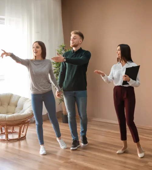 Couple being shown a property.