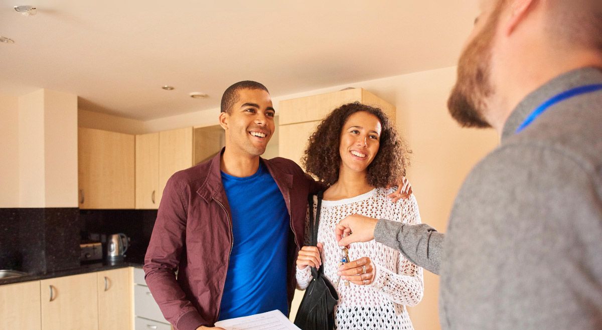 Couple moving into a home.