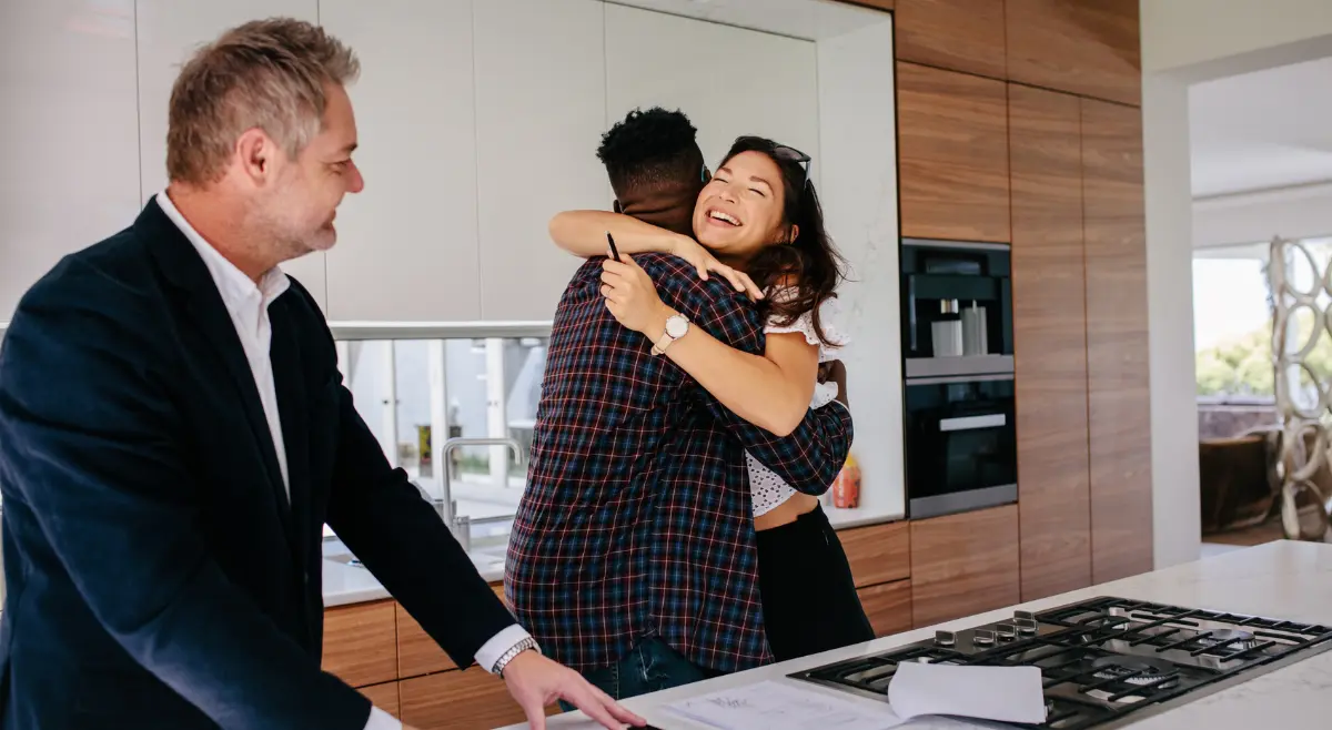 Couple happy about their new home.