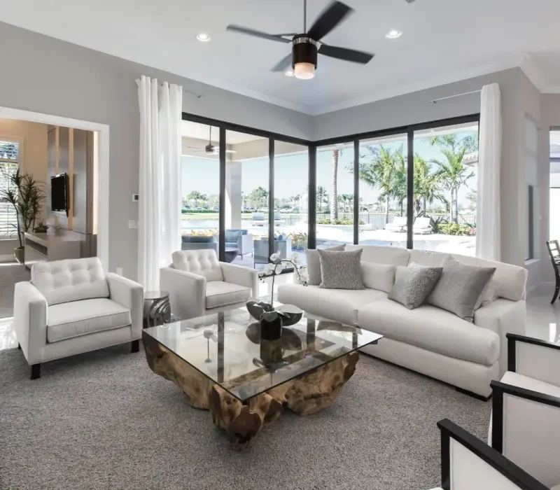 Renovated modern living room in Memphis, TN with updated flooring, paint, and lighting.